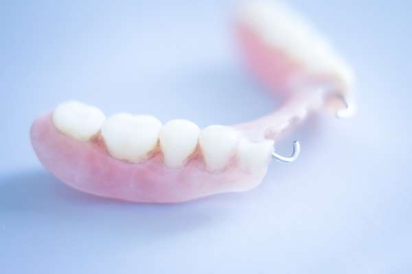 Should I Get Dentures or Dental Implants from The Dental Place of Tamarac in Tamarac, FL